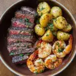 Savor the Sizzle: Indulge in Steak with Shrimp and Garlic Butter Potatoes