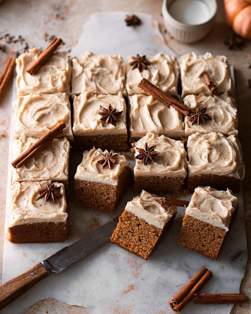The image shows a tray of rectangular cake slices with one thick layer of light brown cake topped by a generous layer of creamy white frosting that has a swirled texture with hints of cinnamon sprinkled on top. Some slices are decorated with star anise, and there are two cinnamon sticks placed upright on one piece. Two slices are slightly pulled away from the group, showing the moist and textured interior of the cake. The tray is placed on a white marbled surface with warm lighting and soft shadows around, with a knife nearby. photo taken with an iphone --ar 4:5 --v 7