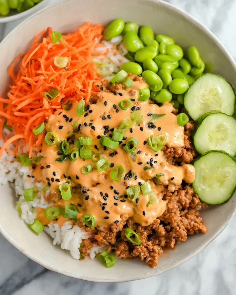 A white plate with four distinct layers: on the left, white rice with small black sesame seeds sprinkled on top; next to it, bright green edamame beans and chopped green onions scattered over the dish; in the center and right, cooked ground meat covered with creamy orange sauce that also spreads slightly over the rice, topped with more chopped green onions and black sesame seeds. In the background, a small pile of shredded orange carrots and blurred slices of cucumber rest near the top edge of the plate. The plate is set on a white marbled surface. Photo taken with an iphone --ar 4:5 --v 7