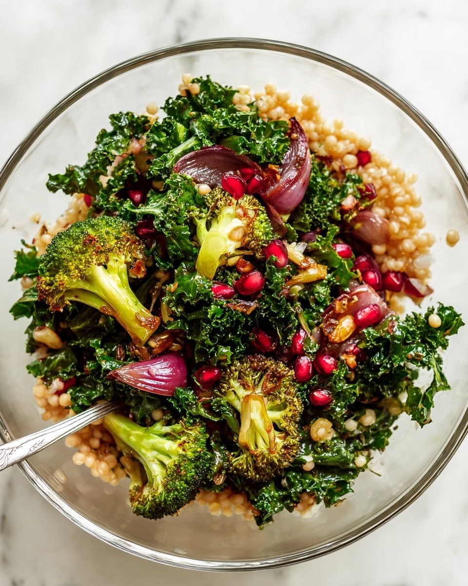 A white bowl filled with a colorful salad showing layers of bright green roasted broccoli and kale leaves at the base, mixed with light brown chickpeas and grains scattered throughout. Deep red pomegranate seeds sit on top, adding shine and contrast, along with light green pumpkin seeds sprinkled over the dish. Fresh green parsley leaves add extra color and texture, all resting on a white marbled surface with a soft striped cream cloth underneath. photo taken with an iphone --ar 4:5 --v 7