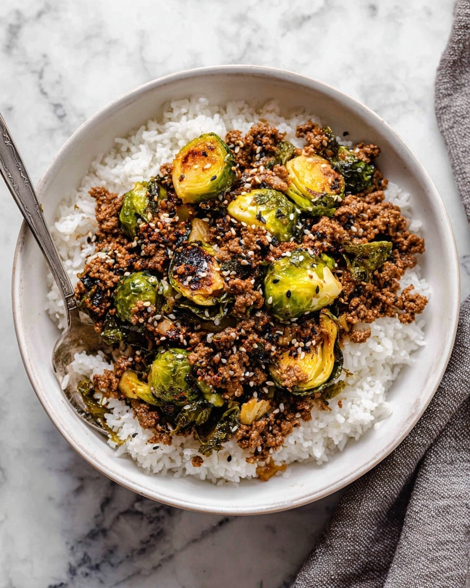 A close-up image of cooked ground meat mixed with sliced Brussels sprouts in a pan, showing two main layers: the first layer is small brown meat crumbles with a slightly oily texture, and the second layer consists of halved Brussels sprouts with light green and yellow tones, some parts browned and slightly crispy. The dish is sprinkled with small white sesame seeds and bits of green herbs scattered throughout. A wooden spoon is lifting a portion of the mixture from the pan, showing the textures and colors clearly against the black pan background. Photo taken with an iphone --ar 4:5 --v 7