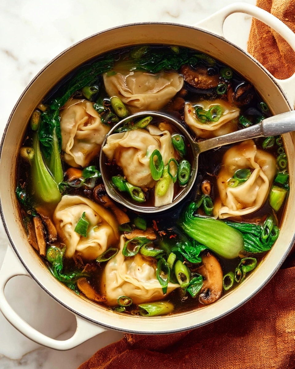 A white pot filled with a clear dark broth holding five light beige dumplings that show soft folds and creases. Bright green leafy bok choy pieces and chopped green onions float among dark brown, sliced mushrooms spreading through the broth. A shiny silver ladle rests inside the pot, scooping up a dumpling, a bok choy leaf, and some mushrooms, highlighting the fresh colors and soft textures. The pot is on a white marbled surface with an orange-brown cloth peeking from underneath. photo taken with an iphone --ar 4:5 --v 7